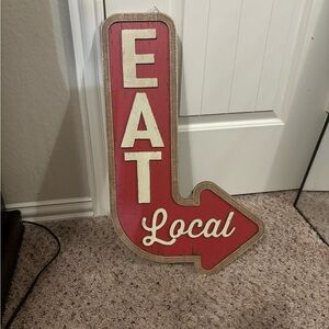 Red 'Eat Local' Arrow Sign